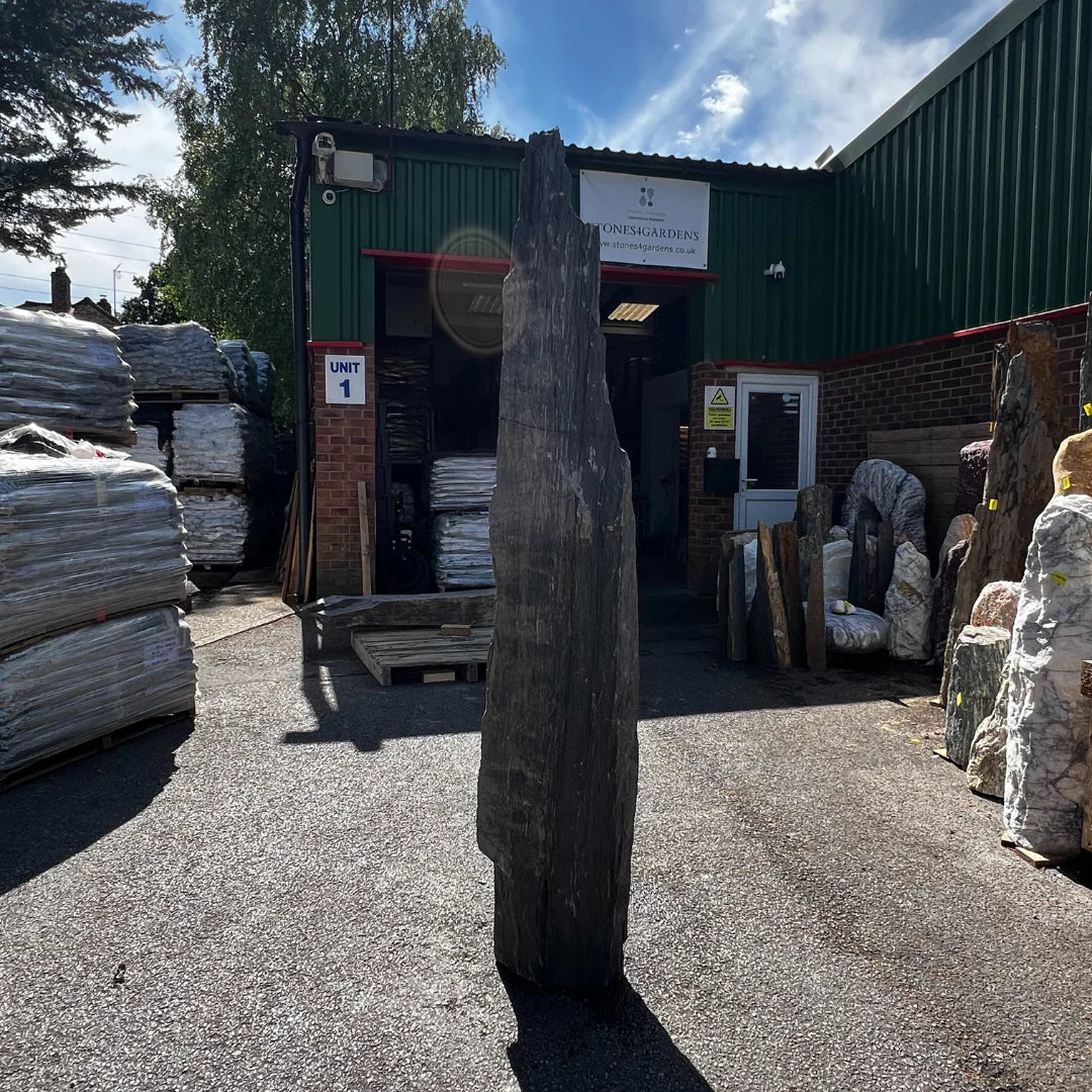 Decorative outdoor stone monolith crafted for landscaping projects, adding elegance to gardens and patios.