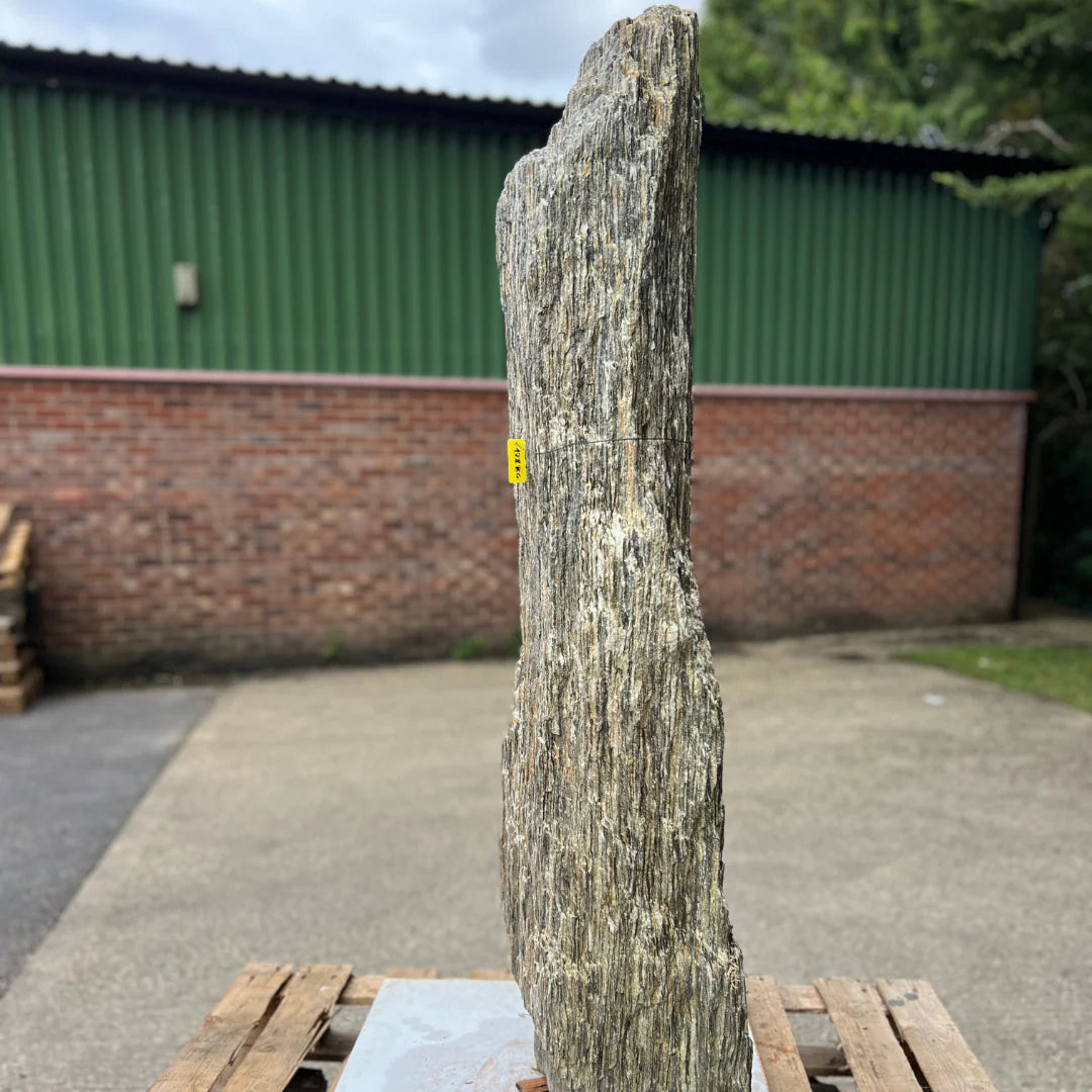 Layered stone garden monolith feature showcasing detailed rock texture, adding elegance to patios and landscaped gardens.