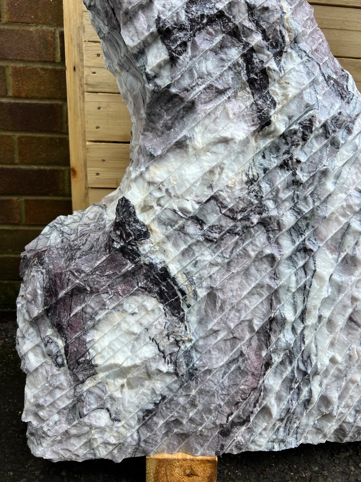 Leylak Marble Monolith MON-052S, Italian-sourced marble stone showcasing purple and white veining, ideal for luxury garden landscapes.