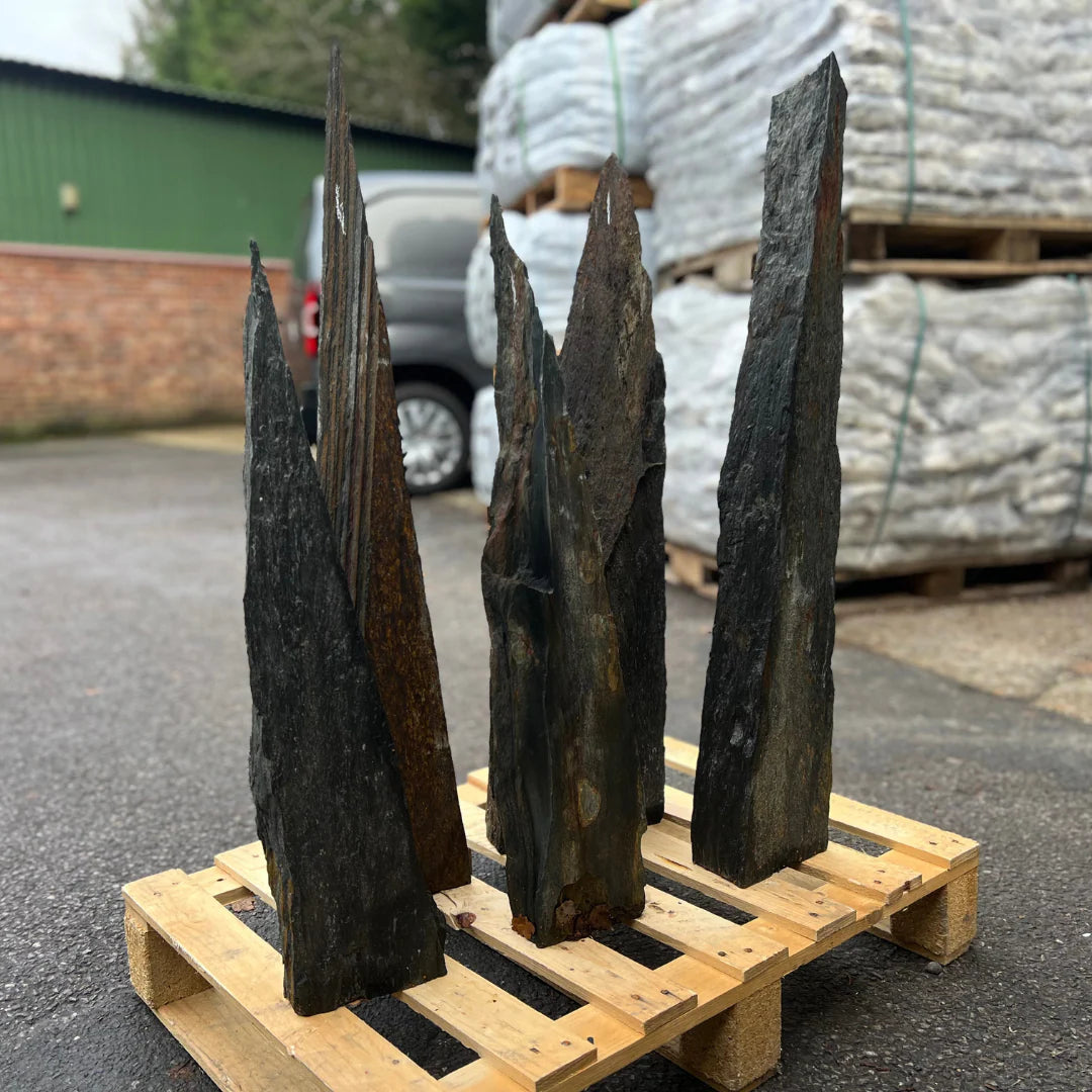 Mini stone monolith set crafted from decorative shale, ideal for adding natural texture and contrast to small garden spaces.