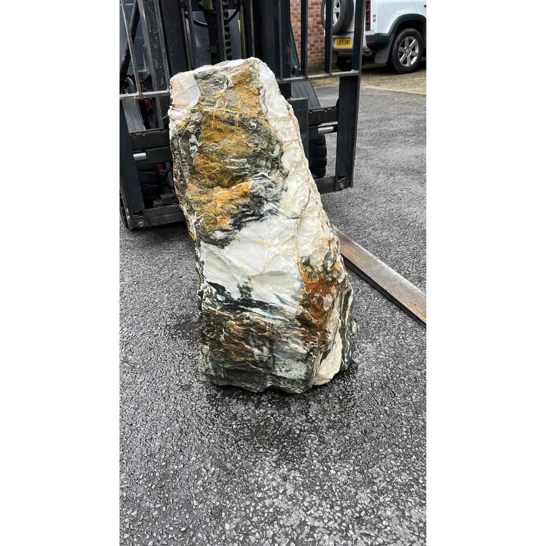 Natural stone monolith MON-033 in gold and grey tones, handcrafted for UK gardens and outdoor landscapes.