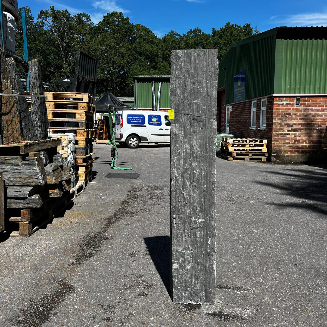 Outdoor garden monolith made from natural stone, weighing 230 kg, adding height and strength to UK gardens.