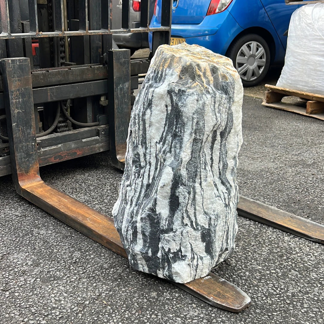 Natural grey monolith with patterned stone texture, available from Stones4Gardens for garden landscaping.