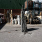 Tall dark natural stone monolith MON-062, handcrafted for UK gardens and outdoor landscaping displays.