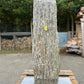 Tall garden stone monolith MON-058 with vertical striations, perfect for enhancing modern and natural landscape designs.