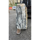 Tall natural monolith with vertical grain texture, ideal as a decorative garden feature among gravel and pebbles.