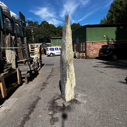 Tall natural stone monolith MON-063 standing 200 cm high, a striking garden feature for UK landscapes.