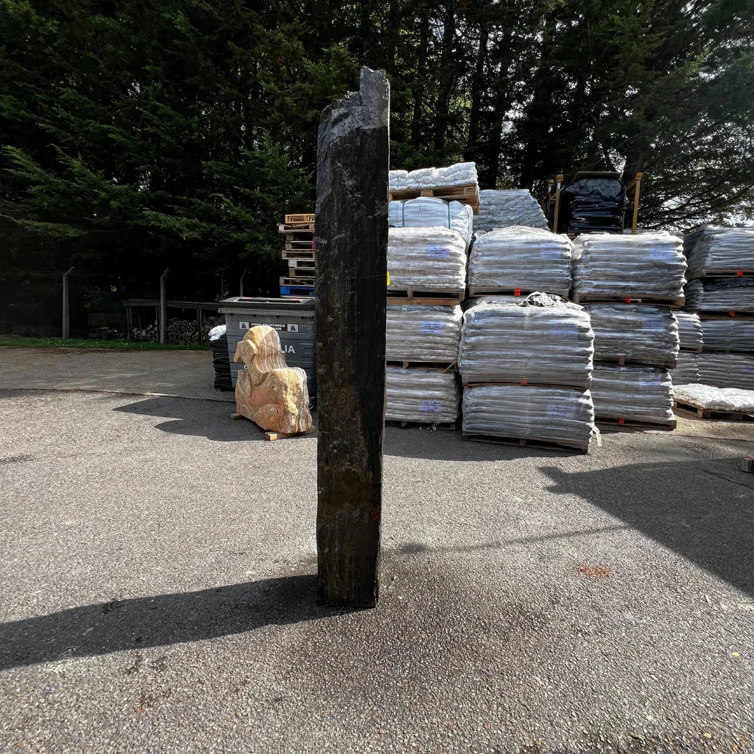 Large standing stone monolith displayed outdoors at Stones4Gardens, perfect for decorative garden settings.