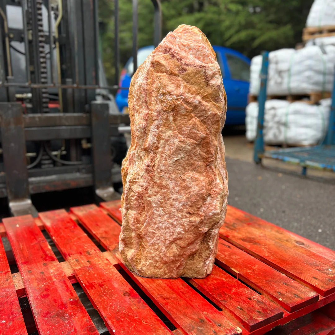 Unique natural garden stone monolith with weathered texture, enhancing any modern or traditional landscape.