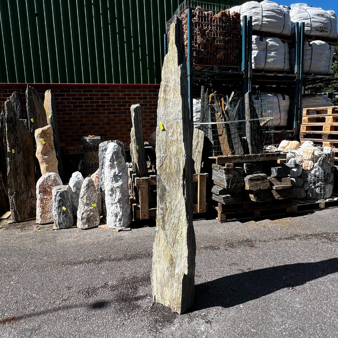 Vertical natural stone monolith with weathered texture, perfect for modern UK garden design and gravel layouts.