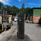 wet natural stone garden monolith with deep grey tones, enhancing modern UK outdoor spaces.